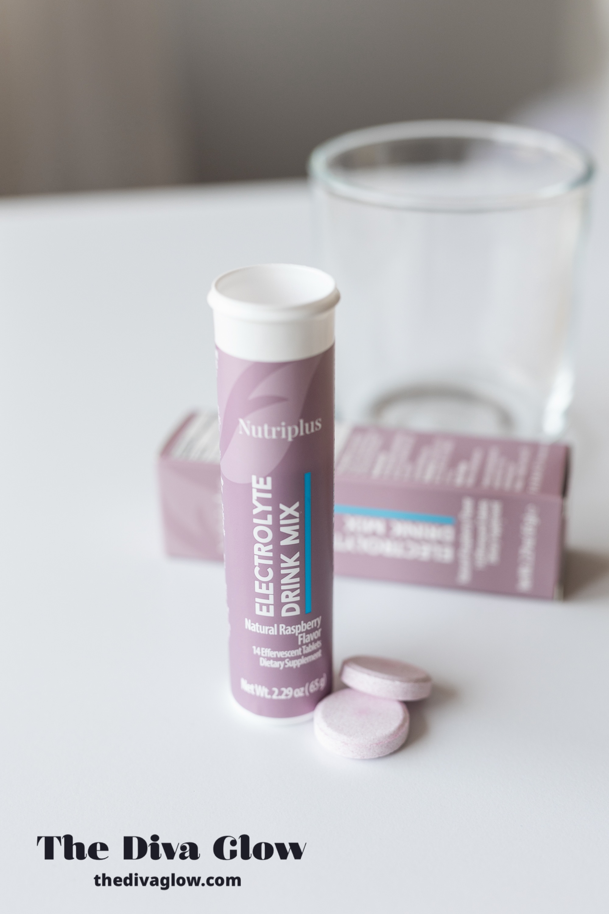 Nutriplus Electrolyte Drink Mix with effervescent tablets and water